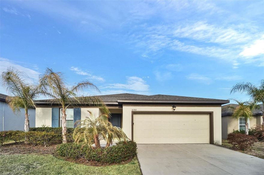 One or more photo(s) has been virtually staged. Welcome to 6785 Branham Mill Ct. in the highly desirable Links at Calusa Springs, one of Zephyrhills’ newest communities offering the rare advantage of NO CDD and a low $125 per month HOA. Situated on a quiet cul-de-sac street. This 2022 home features an open concept floorplan with four bedrooms, two-baths, designed for comfortable everyday living and effortless entertaining. The spacious living area offers a bright, airy layout that flows seamlessly into the kitchen. The kitchen features generous counter space, ample cabinetry, a center island, and a full suite of stainless-steel appliances. The primary suite includes a walk-in closet and a private en-suite bath, while the split-bedroom layout provides added privacy for family or guests. One of the standout features of this home is the backyard setting, there are no rear neighbors, and the property overlooks open green space and community area, creating a peaceful and private backdrop. Enjoy Florida living outdoors on the covered lanai, perfect for relaxing evenings or hosting gatherings. Location truly sets this home apart. With convenient access to Hwy 301, SR 54, and I-75 via Overpass Road, commuting to Tampa and Wesley Chapel is simple and efficient. You’re just 15 minutes from the renowned Epperson and Mirada Lagoons, where resort-style amenities enhance everyday living. Shopping, dining, schools, golf courses, and healthcare facilities are all within easy reach. If you’re searching for a move-in ready newer construction home in Zephyrhills with no CDD fees, low HOA, privacy with no backyard neighbors, and convenient access to Tampa, this property delivers location, lifestyle, and exceptional value.