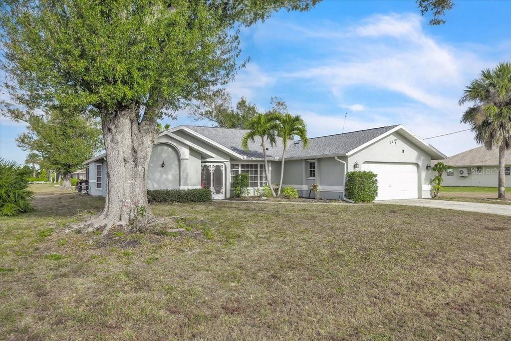 Photo of 272 Broadmoor Lane, Rotonda West, FL 33947 (MLS # C7520186)