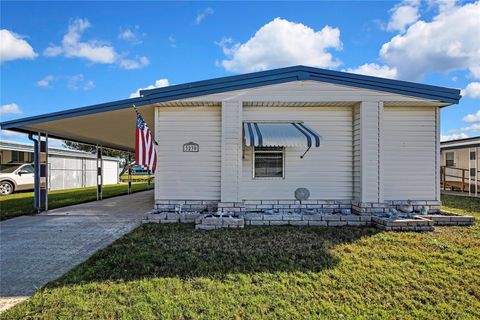 Photo of 3230 Brewster Drive, Holiday, FL 34690 (MLS # TB8460440)