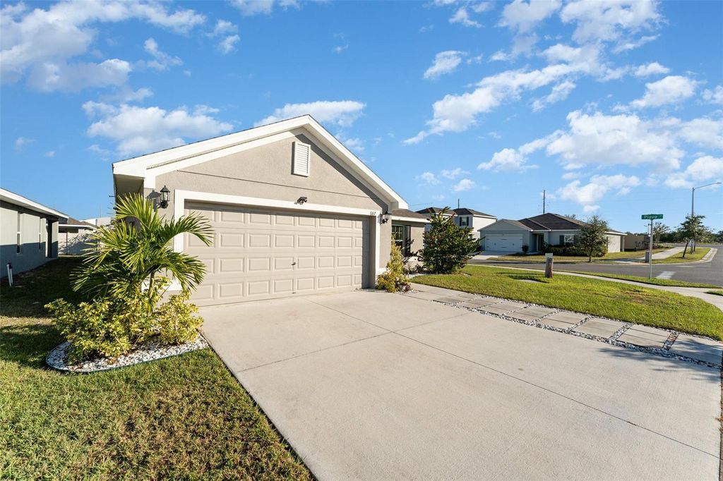 Photo of 687 Tanaro Lane, Haines City, FL 33844 (MLS # TB8449188)