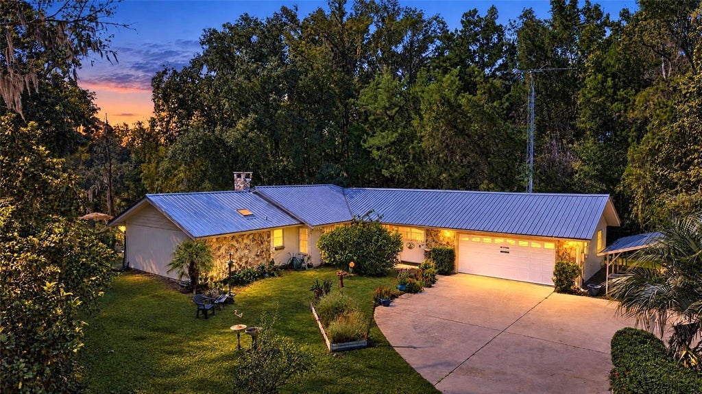 Photo of 12 Palm Circle Drive, Inglis, FL 34449 (MLS # G5119610)