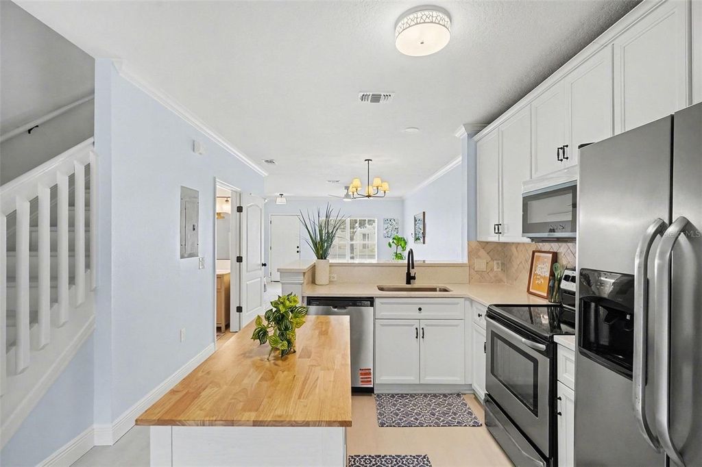 Photo of 1363 Hampton Park Lane, Melbourne, FL 32940 (MLS # O6388624)