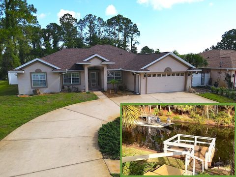 Photo of 47 Pheasant Drive, Palm Coast, FL 32164 (MLS # FC318115)