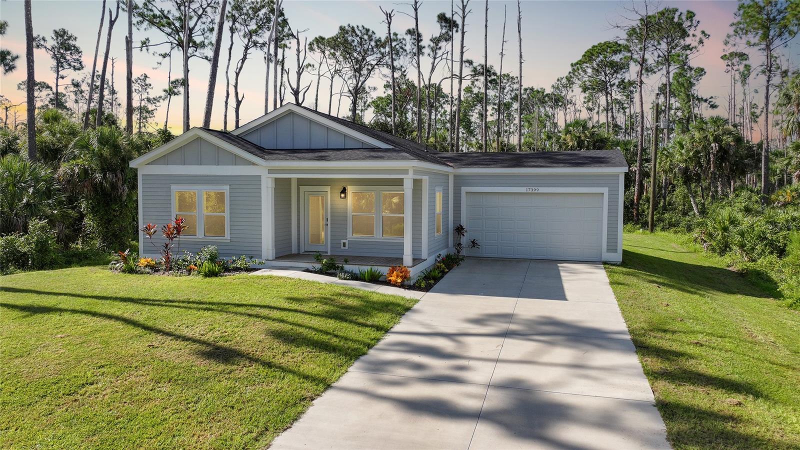 For limited time get 4.99% financing with preferred lender. This home has 3 bedrooms plus a den. As you enter this gorgeous home you will immediately see the beautiful upgrades. The kitchen is a chefs dream with white cabinets, quartz countertops, kitchen island and all stainless steel appliances. You can cook in your kitchen while entertaining guests as it overlooks a spacious Great room and nice size Dining room. This home also features luxury vinyl flooring throuhout the home which makes for easy clean up. The large primary bedroom has a lovely En Suite with dual sinks, gorgeous walk in shower, separate water closet and his & Her closets. The guest bedrooms are also very spacious and not far from the luxury guest bathroom. EXTRA BONUS...... NO FLOOD INSURANCE REQUIRED, HURRICANE IMPACT WINDOWS & DOORS. If the inside of this gorgeous home isn't enough to make you want to live here, then the location should as it is located between interstate 75 and route 41 for easy commuting. The new sunseekers resort is only 9 miles away and the famous island of Boca Grande is only 23 miles away. There is also shopping, Golf Courses, Restaurants, beaches near for that great Florida living. Don't delay make your appointment today. Also see the 3D tour and youtube video attached to this listing.
