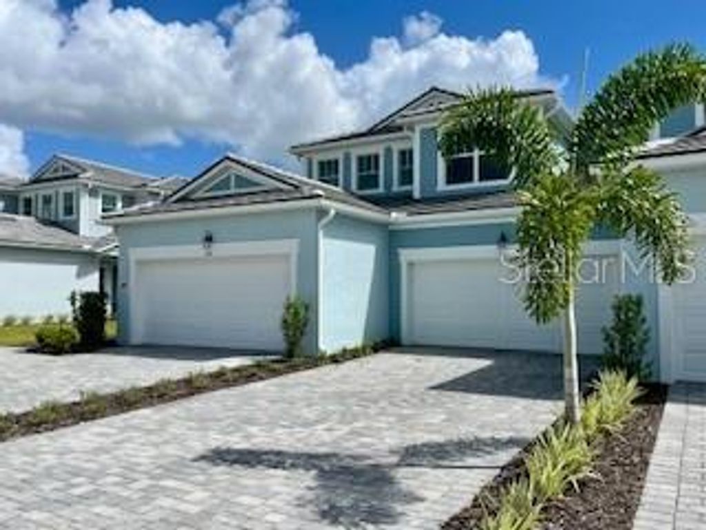 Photo of 17390 Moonflower Drive #101, Venice, FL 34293 (MLS # TB8435495)