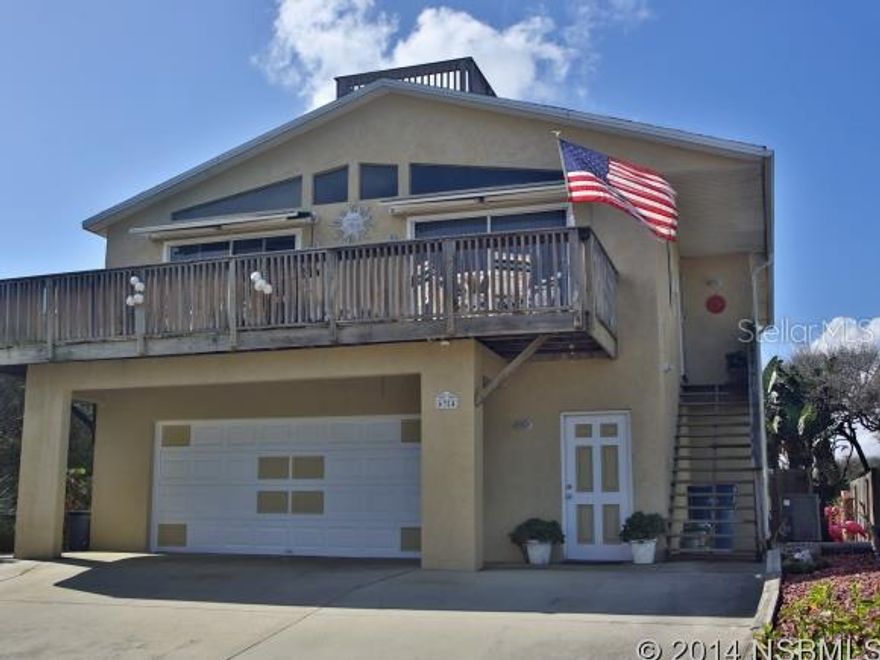 MODERN-BEACHY 3-BEDROOM 2-BATH CHARMER BY THE SEA WITH GORGEOUS ROOF TOP DECK VIEWS OF THE ATLANTIC OCEAN AND THE RIVER... GREAT HOME FOR ENTERTAINING WITH OPEN MODERN KITCHEN AND LIVING ROOM... BEAUTIFUL TILE AND WOOD FLOORING THROUGHOUT. LIGHT AND BRIGHT KITCHEN FEATURES LOTS OF CABINET SPACE...MOSAIC TILE BACK SPLASH..BRUSHED NICKEL FIXTURES...DECORATIVE SHELVING SPACE W/ACCENT LIGHTING... PULL-OUT DRAWERS... LARGE BREAKFAST BAR & DINING AREA. SLIDER WALK-OUT TO LARGE FRONT DECK WITH ROLL-OUT AWNING. TAKE A SHORT FLIGHT OF STAIRS TO ROOFTOP BALCONY WITH BREATHTAKING WATER VIEWS OF THE OCEAN AND RIVER! HAVE TO SEE TO APPRECIATE!!! NICE SIZE MASTER WITH UPDATED FULL BATH AND BEAUTIFUL WOOD FLOORING. TWO GUEST BEDROOMS OR USE ONE FOR AN OFFICE & UPDATED GUEST BATH. PLENTY OF ROOM FOR ALL THE TOYS WITH OVER SIZED 2-CAR GARAGE - MORE THAN 1200SQ. FEET WITH SECOND LAUNDRY...SINK AND SEPARATE LOCKED STORAGE AREA.... PLENTY OF PARKING IN THE DRIVEWAY. MORE ENTERTAINMENT & RELAXATION SPACE IN BACK YARD WITH PAVERED PATIO AND LUSH LANDSCAPING - GREAT FOR FAMILY BBQ'S AND PARTYS. OTHER HOME FEATURES INCLUDE: NEWER WATER HEATER...INSIDE LAUNDRY UPSTAIRS...TRACK LIGHTING... NEWER FANS AND FIXTURES...OUTSIDE CONDENSER 4YRS OLD...OUTSIDE SHOWER. SHORT WALK TO BEACH ACCESS... CLOSE TO CANAVERAL NATIONAL SEASHORE AND J.B.'S FISH CAMP. FLORIDA LIVING BY THE SEA AT ITS BEST!!!! ;Water: City