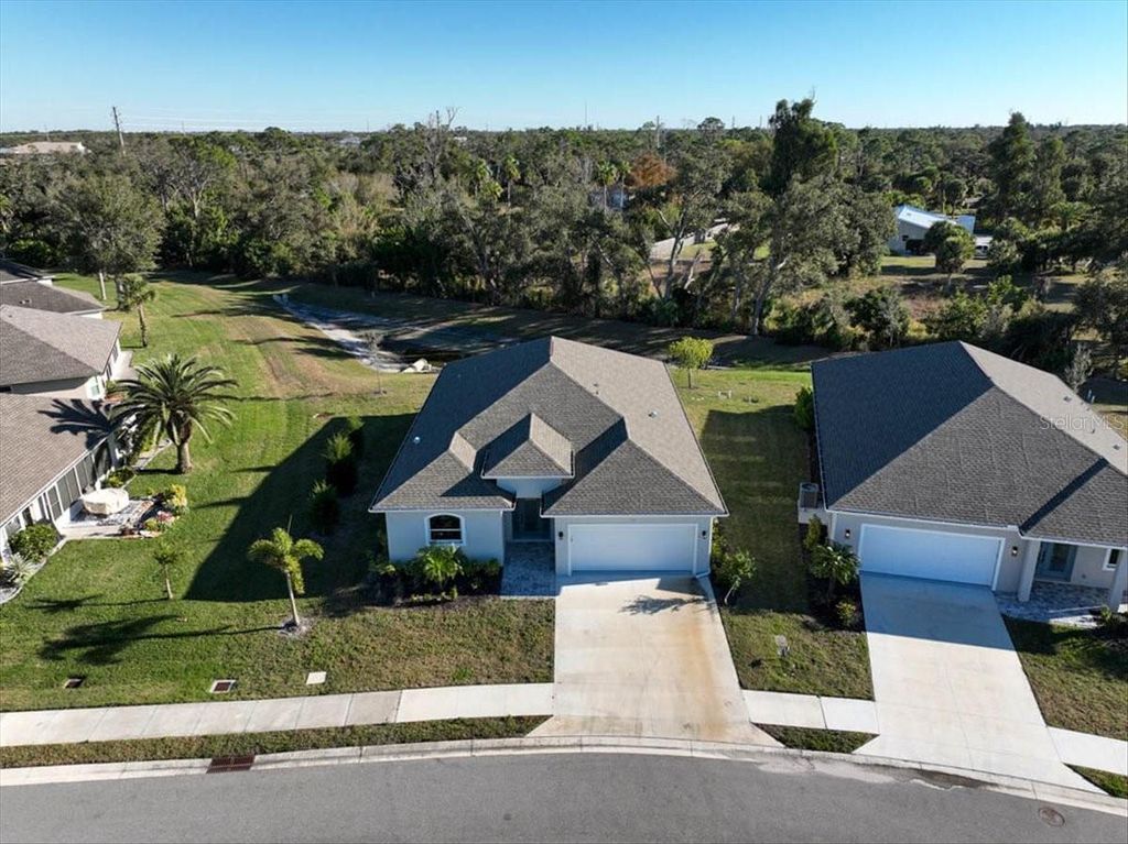 Photo of 725 Redbud Court, Englewood, FL 34223 (MLS # D6146000)