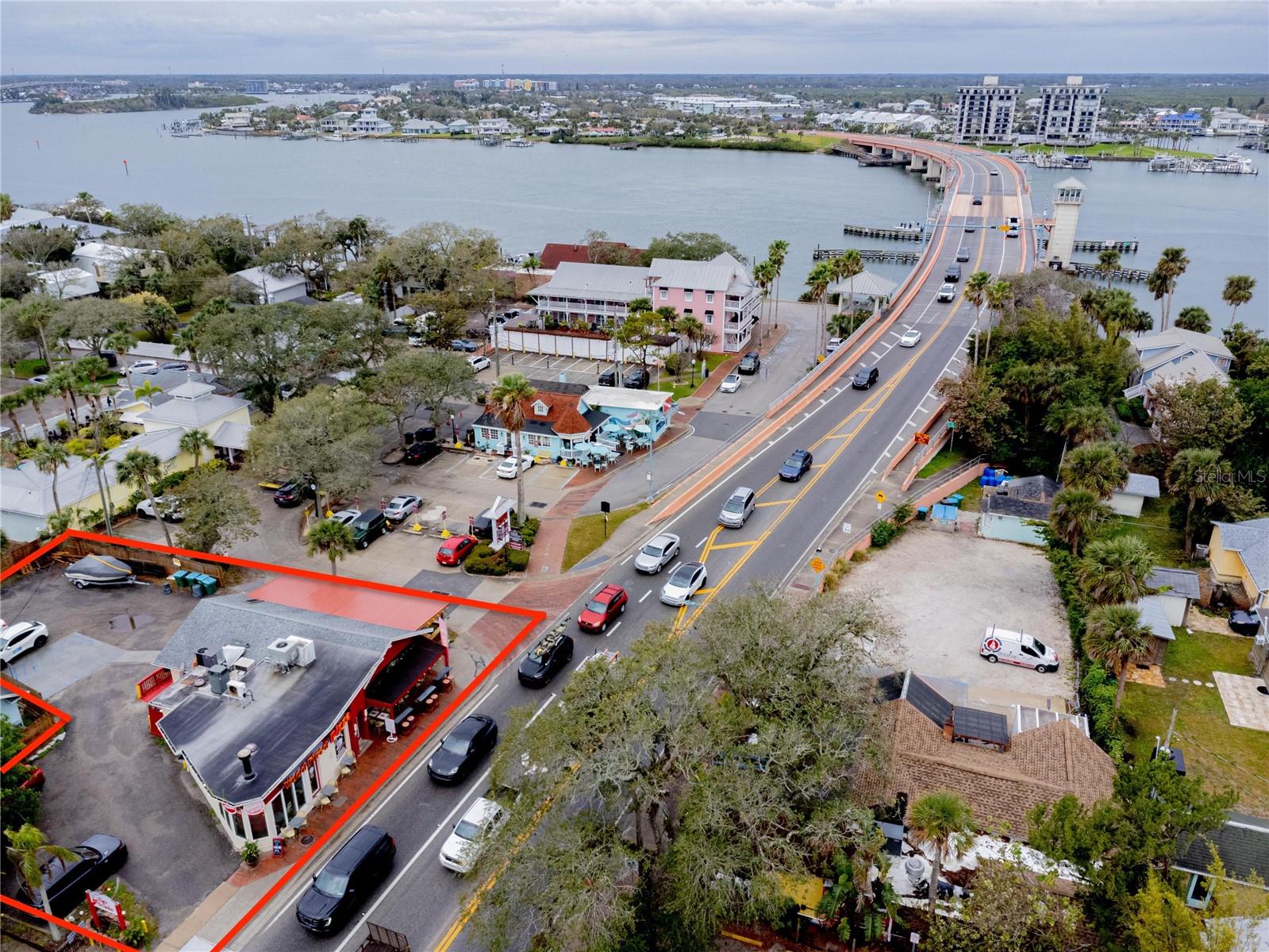 Prime New Smyrna Beach-Flagler Avenue- Business, with building and land TURN KEY Opportunity! Located in the heart of New Smyrna Beach’s iconic Flagler Avenue, this 1,800 sq. ft. commercial building sits on a 7,500 sq. ft. lot with 13 dedicated parking spaces—a rare find in this prime location. The property is home to a fully operating restaurant with a liquor license, two exterior dining patios. This is a turnkey opportunity in a high-traffic beachside district, offering both stability and growth potential. Don’t miss your chance to own a piece of iconic Flagler Avenue!