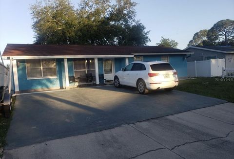 6718 RUNNINGWOODS DRIVE TAMPA FL 33634