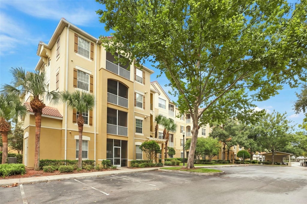 Photo of 3326 Robert Trent Jones Drive #40602, Orlando, FL 32835 (MLS # O6438228)