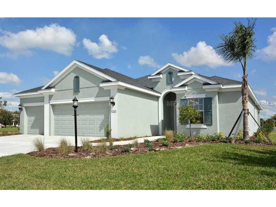 Gorgeous lake view from this "Early Spring" plan Neal home. This home offers 3 bedrooms, 2.5 baths, a Den and a 3 car garage in 2530 square feet of living space. Enjoy entertaining in the great room just off the kitchen. Upgraded tile flooring throughout the main living areas, rich wood cherry cabinets and granite counter tops in the kitchen. And there is plenty of room to add a pool if you so desire. River's Reach has wonderful amenities including a community pool, spa, private fitness center and kayak/canoe access to the Manatee River. Come see this lovely home today!