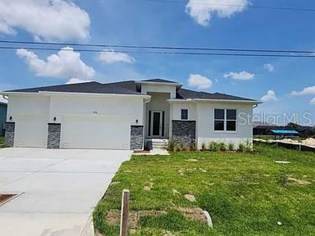Photo of 9231 Key West Street, Port Charlotte, FL 33981 (MLS # L4956056)