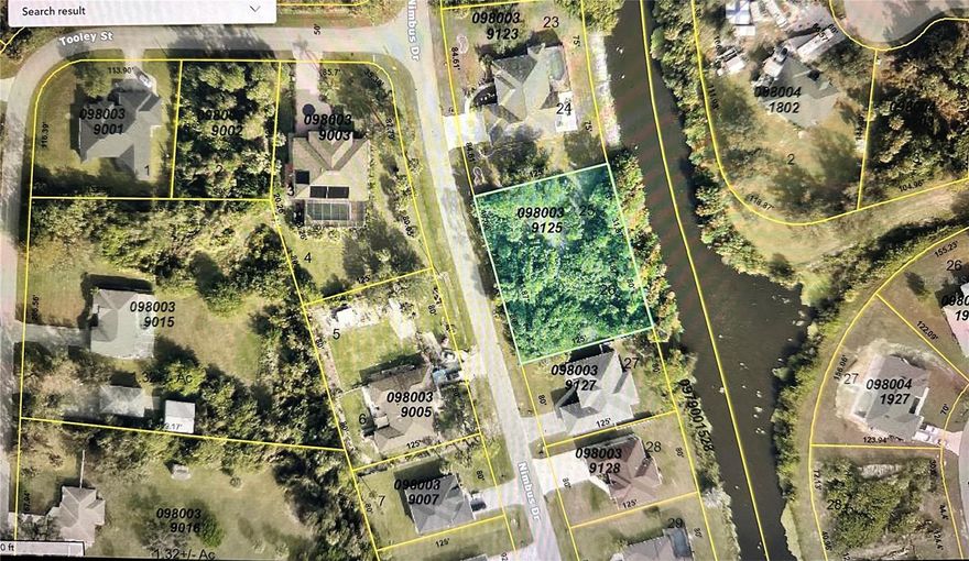 DOUBLE Elevated LOT on a CANAL! Can use as is or split to 2 sites. Nice, established neighborhood. Ready to build upon today!  Electric to site. Flood zone X. Not on Scrub Jay list at time of listing. No HOA or CDD! Make this wonderful site yours today. Centrally located to EVERYTHING...US-41, I-75, schools, Suncoast Technical College, Shannon Staub Library, and plenty of grocery & retail shopping, and dining.