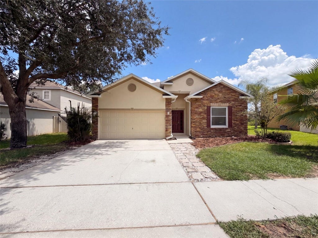 Photo of 419 Hammerstone Avenue, Haines City, FL 33844 (MLS # O6438929)