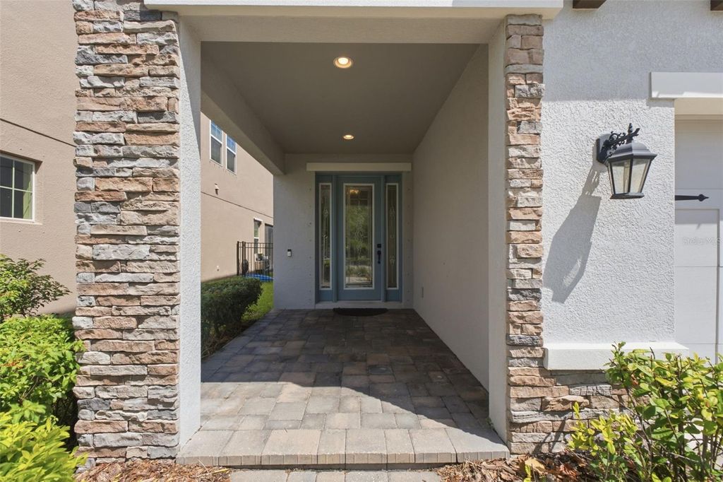 Photo of 5080 Ballantrae Boulevard, Land O Lakes, FL 34638 (MLS # TB8524257)