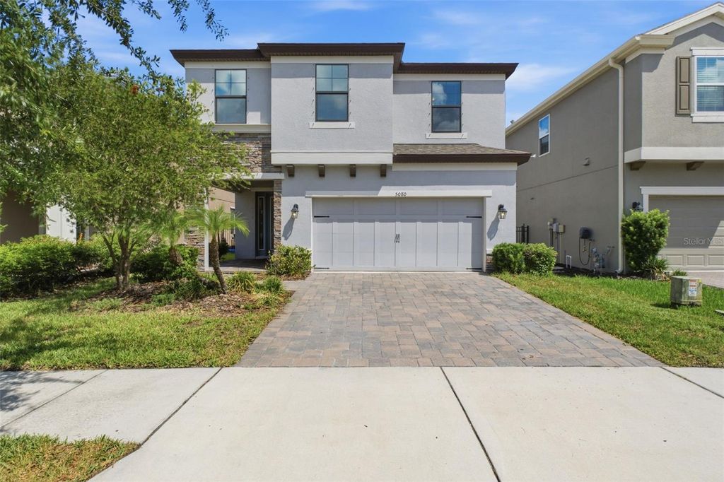 Photo of 5080 Ballantrae Boulevard, Land O Lakes, FL 34638 (MLS # TB8524257)