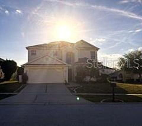 Photo of 313 Higher Combe Drive, Davenport, FL 33897 (MLS # O6399361)