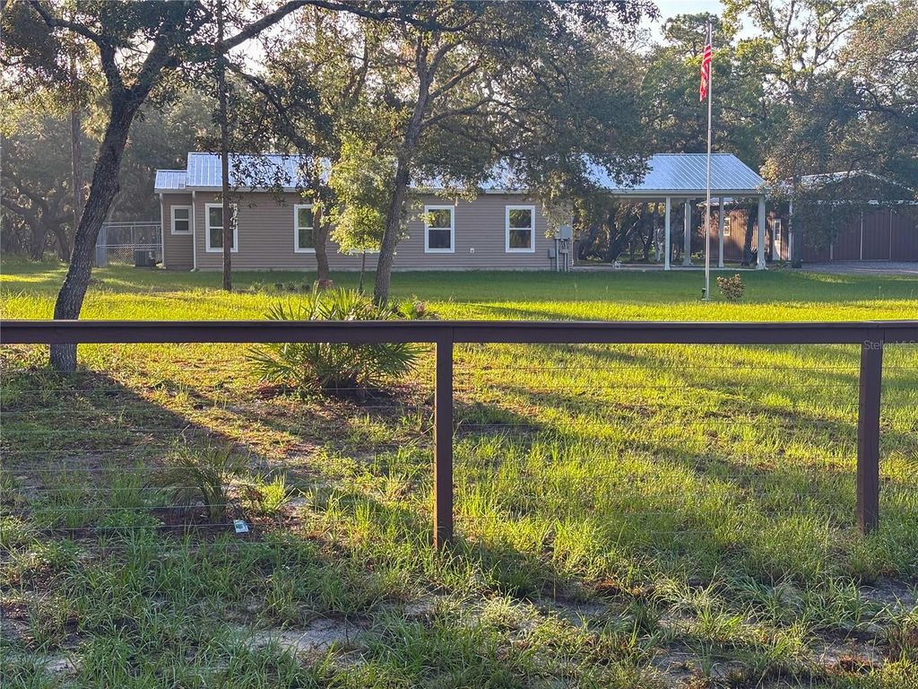 Photo of 399 N Conrad Avenue, Lecanto, FL 34461 (MLS # O6328492)