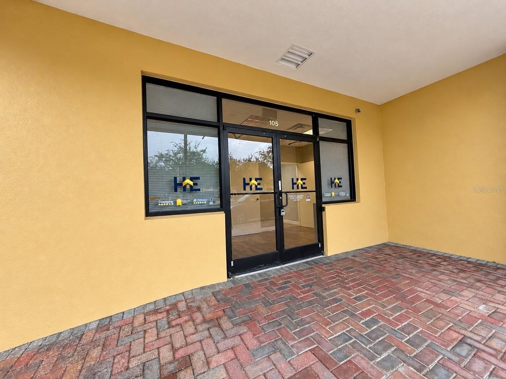 Photo of 13538 Village Park Drive #J105, Orlando, FL 32837 (MLS # O6449236)