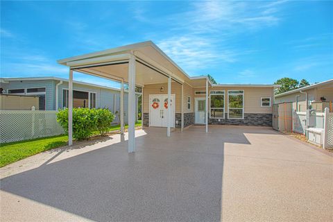 Photo of 110 Windsong Way #110, Titusville, FL 32780 (MLS # O6317253) Photo of 110 Windsong Way #110, Titusville, FL 32780 (MLS # O6317253)