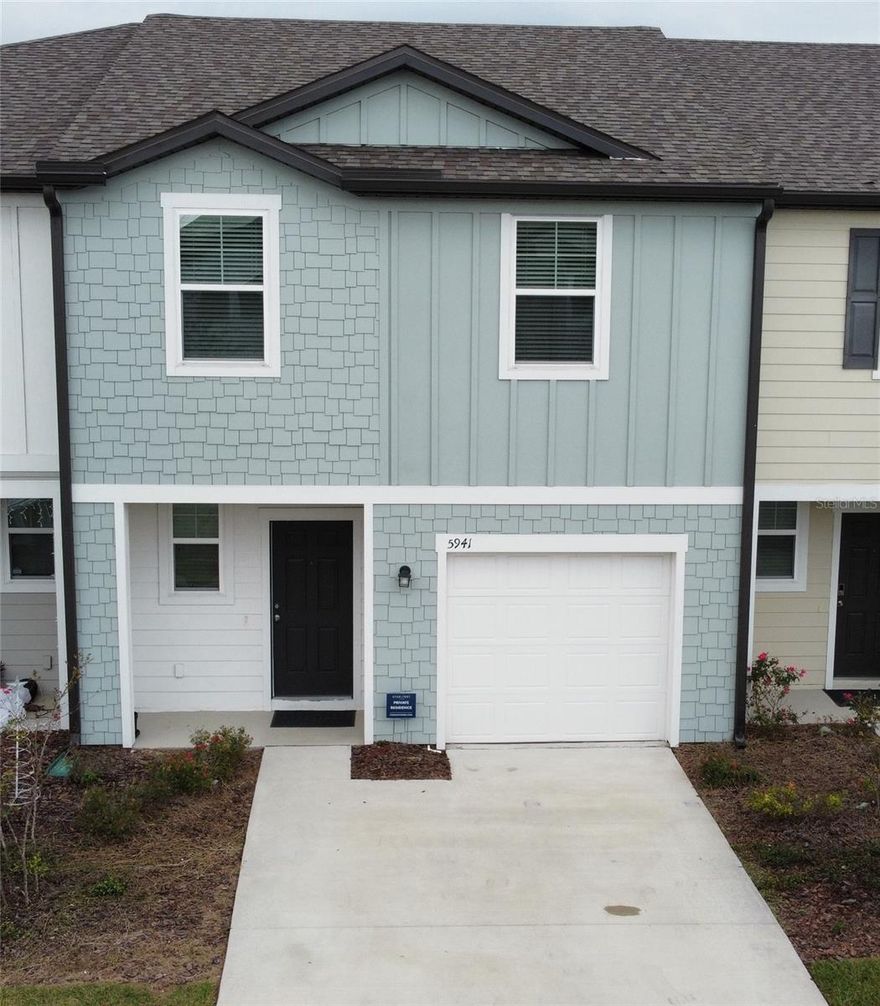 Welcome to this beautiful 3-bedroom, 2.5-bathroom townhome located in the highly desirable Ashford Place community in St. Cloud. This modern COSMOS model features a bright open-concept layout with a spacious living, dining, and kitchen area—perfect for everyday living and entertaining. The sleek kitchen includes stainless steel appliances, granite countertops, a pantry, and the property is equipped with a complete water filtration system for added comfort and peace of mind.
Upstairs you’ll find two comfortable secondary bedrooms, a full bathroom, a laundry closet, a linen closet, and a private primary suite complete with a walk-in closet and ensuite bathroom with granite countertops. Additional features include a one-car garage and driveway.
The community offers excellent amenities including pond views, a playground, a dog park, and open green spaces. Conveniently located near Narcoossee Road, just minutes from Lake Nona, shopping, dining, Orlando International Airport, medical facilities, and major highways. Clean, stylish, and move-in ready—schedule your showing today!