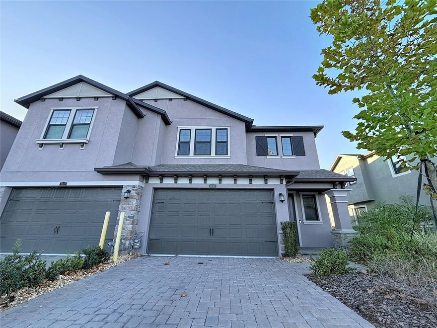 Welcome to 4547 Ancona Way — your dream townhome in the highly coveted Sortino section of Estancia at Wiregrass Ranch! This stunning Vittoria floorplan, built by WCI in 2022, offers over 2,000 square feet of luxurious, thoughtfully designed living space.

As you step into this desirable end unit, you’ll immediately notice its pristine condition and array of modern upgrades. The grand two-story foyer, highlighted by an elegant staircase, sets the tone for the sophistication found throughout.

At the heart of the home lies the gourmet kitchen, featuring a timeless white design, sleek quartz countertops, and premium stainless steel appliances — perfect for both everyday cooking and entertaining. The open-concept layout flows seamlessly into a spacious living and dining area, complemented by a cozy dinette just off the kitchen. Need a quiet workspace or flexible area? The large den/office adjacent to the main living space provides endless possibilities. Enjoy the outdoors on your extended pavered lanai, ideal for hosting guests or simply relaxing in the Florida sunshine.

Beyond the home itself, Estancia at Wiregrass Ranch offers a vibrant lifestyle with resort-style amenities, including beautifully landscaped parks, walking trails, and resort-style pools. The community’s prime location provides convenient access to shopping, dining, and top-rated schools, making it perfect for families and professionals alike.

Don’t miss this rare opportunity to own a piece of paradise in Estancia at Wiregrass Ranch. With its modern design, luxurious finishes, and unmatched community amenities, this townhome truly stands out. Schedule your private tour today and experience the perfect blend of elegance, comfort, and convenience — your dream home awaits!