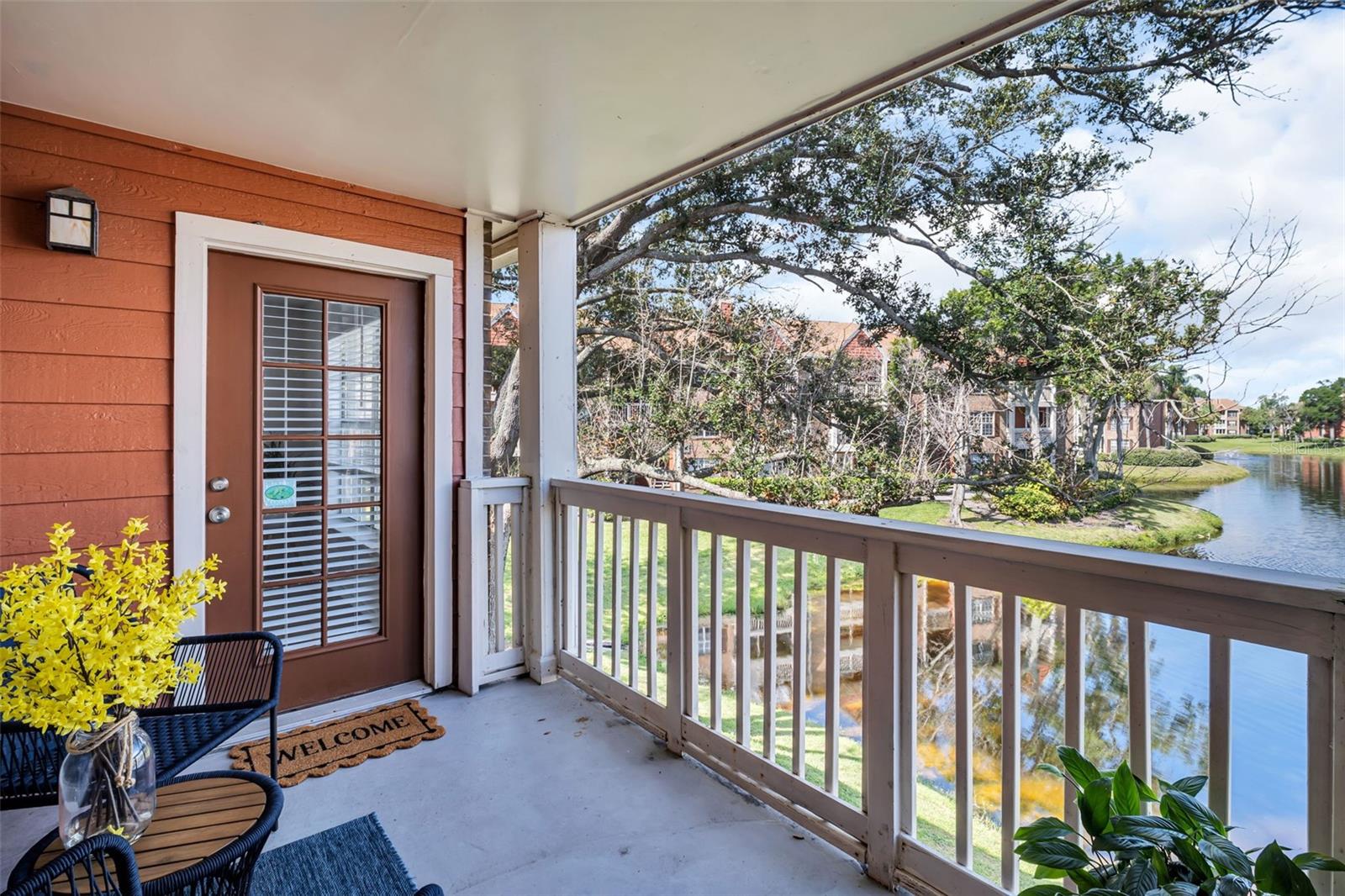 Welcome to your serene lakefront retreat! This beautifully maintained 2-bedroom, 2-bath condo is perfectly situated on the 2nd floor, offering lake views and pool views from a private balcony for peaceful living. The kitchen was completely remodeled in 2025, featuring new appliances, cabinets, and countertops—making it a modern and stylish space to cook and entertain. Enjoy spacious living areas filled with natural light. Both the primary suite and the guest bedroom can accommodate king-sized beds and have walk-in closets. Additional highlights include a full size washer and dryer in the unit, a gated community, and is PET FRIENDLY. The community offers a gorgeous pool, fitness room, car washing station, ample parking, and tennis courts. Don’t miss this opportunity to own a move-in ready condo with the perfect blend of comfort and charm! Conveniently located between Clearwater, St. Petersburg, and Tampa.