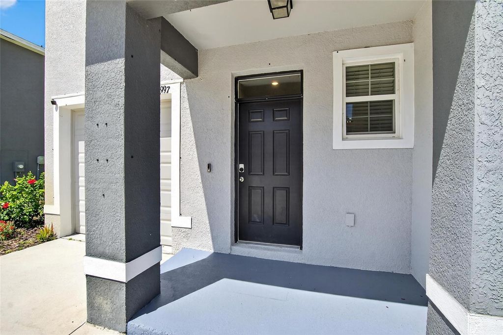 Photo of 32997 Kaloko Road, Wesley Chapel, FL 33543 (MLS # TB8418681)