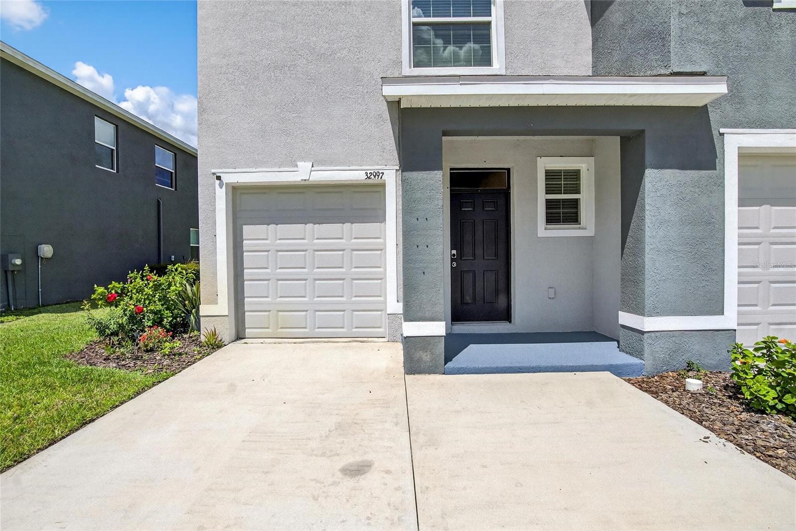?? For Sale: Stunning End-Unit Townhome in Union Park – Wesley Chapel ??
This beautifully maintained 3-bedroom, 2.5-bath end-unit townhome offers 1,758 sq. ft. of stylish living in one of Wesley Chapel’s most sought-after resort-style communities. Designed with durable all-concrete block construction, the home features an open-concept layout, a versatile loft, and a one-car garage with a two-car driveway.
The interior showcases a modern kitchen with granite countertops, wood cabinetry, recessed lighting, and a large pantry, opening into a spacious family room with triple sliding glass doors leading to a covered lanai. Upstairs, the owner’s suite includes two walk-in closets, dual vanities, and a walk-in shower, while two additional bedrooms share a Jack-and-Jill bath. A loft and an upstairs laundry room with washer and dryer add everyday convenience.
This home is offered semi-furnished, including a contemporary dining table, a decorative accent stand, a sleek TV console, a versatile workstation, and thoughtful extras like a Tesla universal wall charger, custom pantry racks, and a shoe storage system.
Union Park residents enjoy resort-style amenities such as multiple pools, a fitness center, splash pad, playground, basketball court, and walking trails, with HOA fees covering ULTRAFi high-speed internet and cable. Zoned for A+ rated schools and just minutes from shopping, dining, and major expressways, this home delivers the perfect blend of comfort, convenience, and community living.
?? Schedule your private showing today!