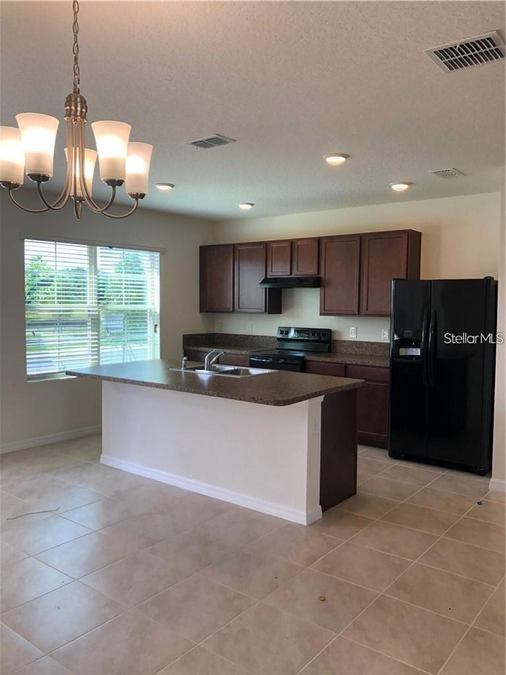 Photo of 1851 Red Canyon Drive, Kissimmee, FL 34744 (MLS # S5147664)