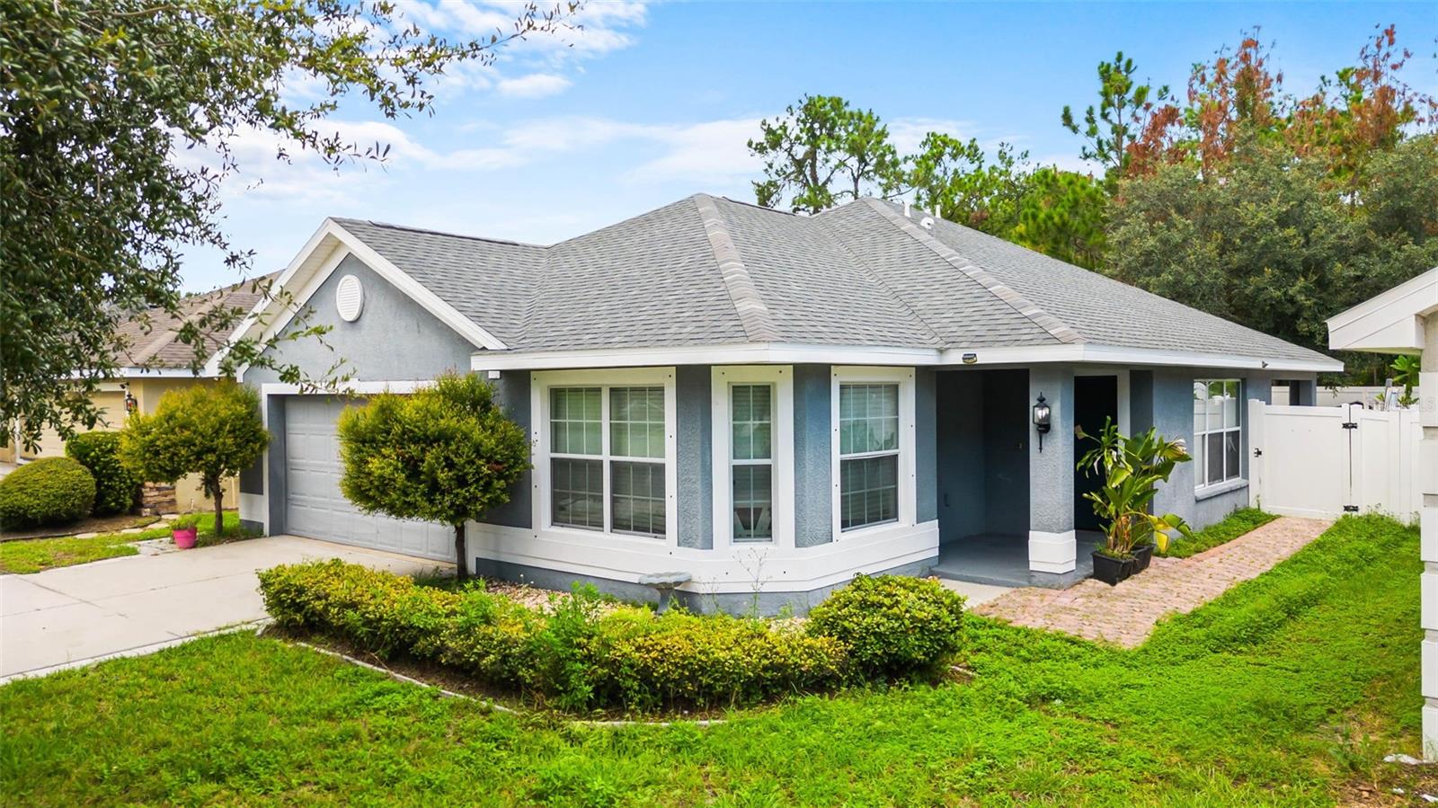 Welcome to this charming 3-bedroom, 2-bathroom single-family home located in the heart of Wimauma. New roof was installed in July 2025! Nestled on a generously sized lot with mature trees and vinyl privacy fencing, this property offers comfort, space, and convenience.
Step inside to find a bright and open layout perfect for everyday living. The master suite features a spacious walk-in closet and a private bath. Enjoy the Florida lifestyle outdoors with a covered patio ideal for relaxing or entertaining, plus a backyard shed for extra storage.
Additional highlights include a 2-car garage, low HOA fees, and a prime location close to local grocery stores, restaurants, and daily essentials. Conveinently located close to I301 & I75 with direct access to Tampa and the airport.