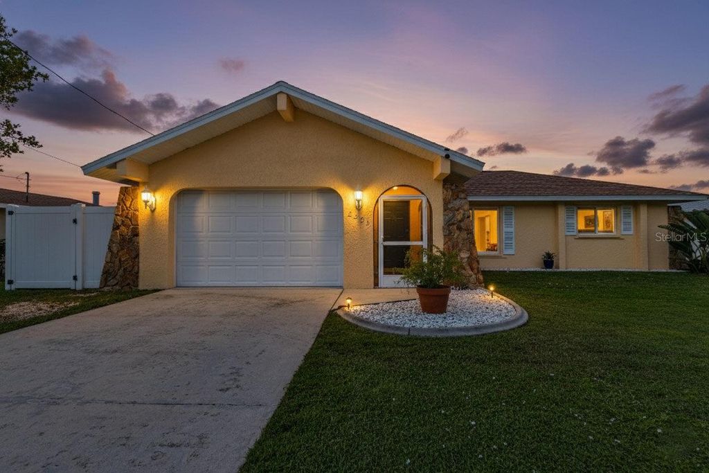 Photo of 3261 Rock Creek Drive, Port Charlotte, FL 33948 (MLS # C7515638)
