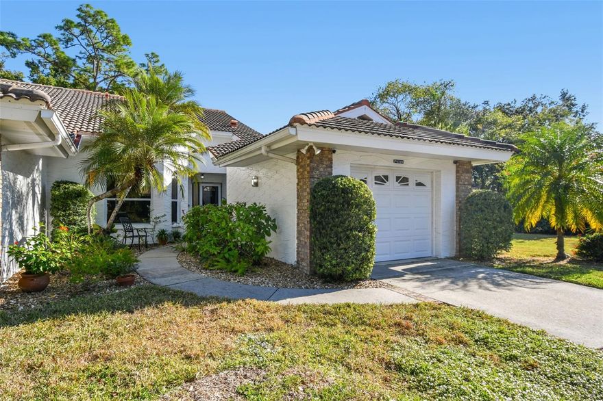 Welcome to Garden Lakes, a beautifully maintained gated 55+ community where comfort, convenience, and coastal living come together. This inviting two-bedroom, two-bath villa offers 1,456 sq. ft. of well-designed living space, enhanced by abundant natural light, peaceful pond views, and access to a charming shared deck overlooking the water.

The kitchen is both stylish and functional, featuring quartz countertops, solid wood cabinetry, stainless steel appliances, a closet pantry, and a delightful bay-window dinette—perfect as a breakfast nook or a cozy home office space.

The primary suite is a serene retreat with tranquil pond views, a private dressing room with sit-down vanity and sink, dual closets including a walk-in, and an en-suite bathroom with a spacious walk-in shower.

Enjoy year-round relaxation in the enclosed Florida room, which is under central air and framed by glass windows that showcase the beautiful pond setting. Additional features include a generous dining area with bay windows, a versatile second bedroom ideal as a den or office, an inside laundry room with side-by-side washer and dryer, and an attached one-car garage with workshop space, built-in cabinetry, and attic storage.

Garden Lakes offers an active lifestyle with access to a recently updated clubhouse, fitness center, billiards room, heated pool, tennis and pickleball courts, shuffleboard, and scenic walking trails.

Perfectly situated near the shopping, dining, and world-class beaches of Bradenton, Sarasota, and Anna Maria Island, this villa provides the ideal Florida coastal lifestyle in a peaceful, friendly community.