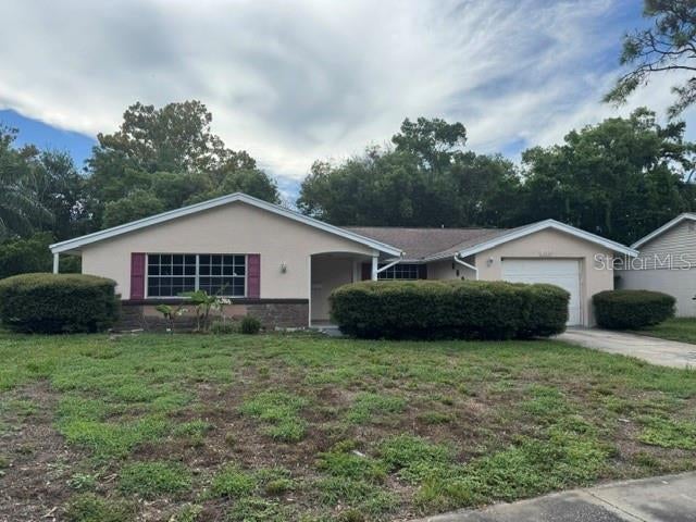 Photo of 12223 Bear Claw Loop, Hudson, FL 34667 (MLS # W7889317)