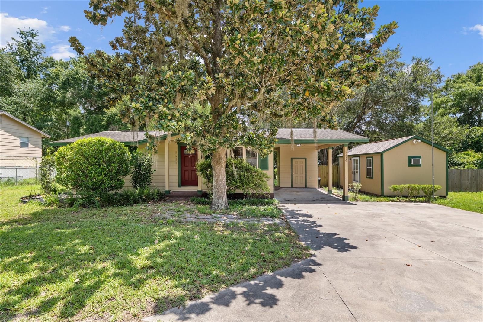 This cozy 2-bedroom, 1-bathroom home is nestled on a .24-acre lot and features a fenced in back yard perfect for pets, or outdoor gatherings. Enjoy the convenience of a covered carport, an exterior laundry room, and a bonus shed with carpet and a window unit, ideal for a home office, studio, or hobby room. With a manageable layout and great outdoor space, this home is a fantastic option for first-time buyers, downsizers, or investors.