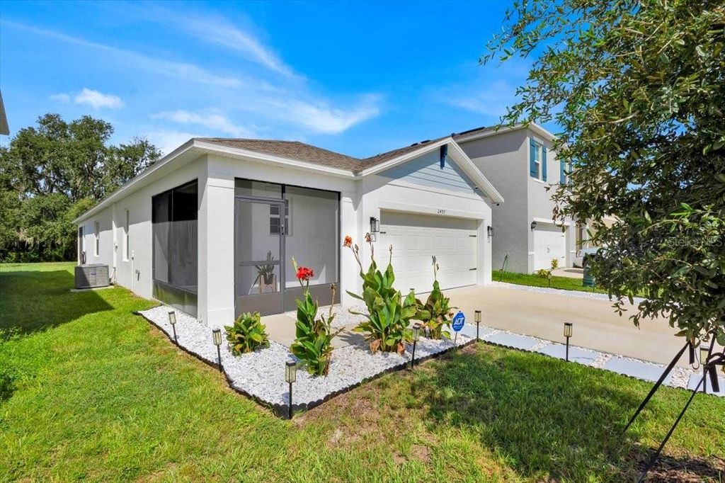 Photo of 2497 Ribbon Fall Avenue, Davenport, FL 33837 (MLS # O6341626)