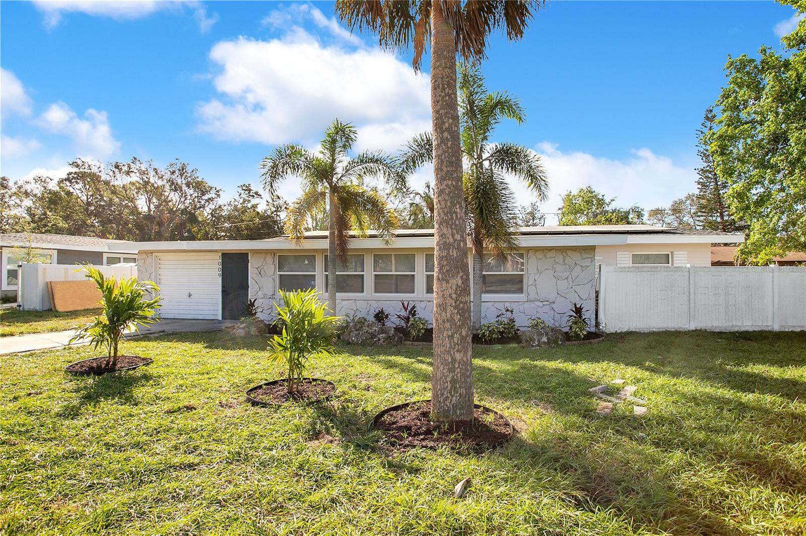 Beautiful and spacious 3BR/2BA pool home offering the perfect mix of modern luxury and Florida charm. Located in an X flood zone on a ¼+ acre lot, this property was unharmed by hurricanes Helene and Milton. Major updates include new windows, roof, Solar Edge solar panels (PAID OFF, 2021), and 2024 AC—enjoy peace of mind and low energy bills!
The open floor plan features include a kitchen with quartz countertops, custom wood tone cabinetry, and stainless-steel appliances. The spacious primary suite and remodeled bathrooms deliver a spa-like feel. Outside, relax in your private oasis with a sparkling pool, Tiki hut, lush landscaping, and an oversized lot with plenty of room for a boat, RV, or toys.
All information and dimensions are deemed accurate, buyer and Agent to verify.
This move-in ready home is close to parks, shopping, and dining—don’t miss it! Schedule your showing today!