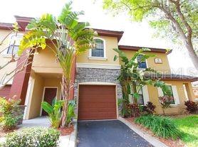 Luxury resort living in this first floor 3 bedroom 2 bath condo with an attached garage 1 car garage at the entrance to the world class Innisbrook Resort and Golf Course! Perfect location just across from the clubhouse and pool/spa but private enough with a rear building entrance. The 2 large screened in lanais, new kitchen cabinets with granite countertops, newer flooring, newer appliances, plantation shutters and first floor open floor plan is what sets this condo apart from the rest. This luxury complex offers 2 heated pools, a heated whirlpool spa with waterfall, clubhouse with fitness room, billiards, theater and party room, tennis/pickleball courts and car wash area.