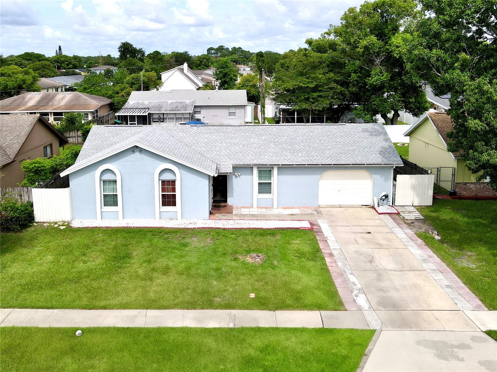 WELCOME TO THIS LOVELY FAMILY HOME!! NO HOA! Whether you're a first-time homebuyer looking for the perfect starter home or an investor seeking excellent cash flow potential, this 4-bedroom, 2-bathroom block home is a must-see! Nestled in a quiet neighborhood with unbeatable proximity to all the best Orlando destinations, this property is just minutes from SR-528 and the Turnpike, ensuring quick travel to Disney, Lake Nona, Medical City, the Convention Center, amusement parks, and the Orlando International Airport. —perfect for entertaining. One of the standout features of this home is the Water Filter system, Windows and Front door resisting hurricane, an amazing bonus and great room for multiples uses. A/C unit are from 2019. The ROOF is 2022! The spacious backyard is perfect for outdoor living, whether you're hosting gatherings or enjoying your privacy. Whether you're looking for a comfortable home for your family or a high-potential investment property in the heart of the Orlando market, this home has it all! Don't miss your chance—schedule your private showing today!