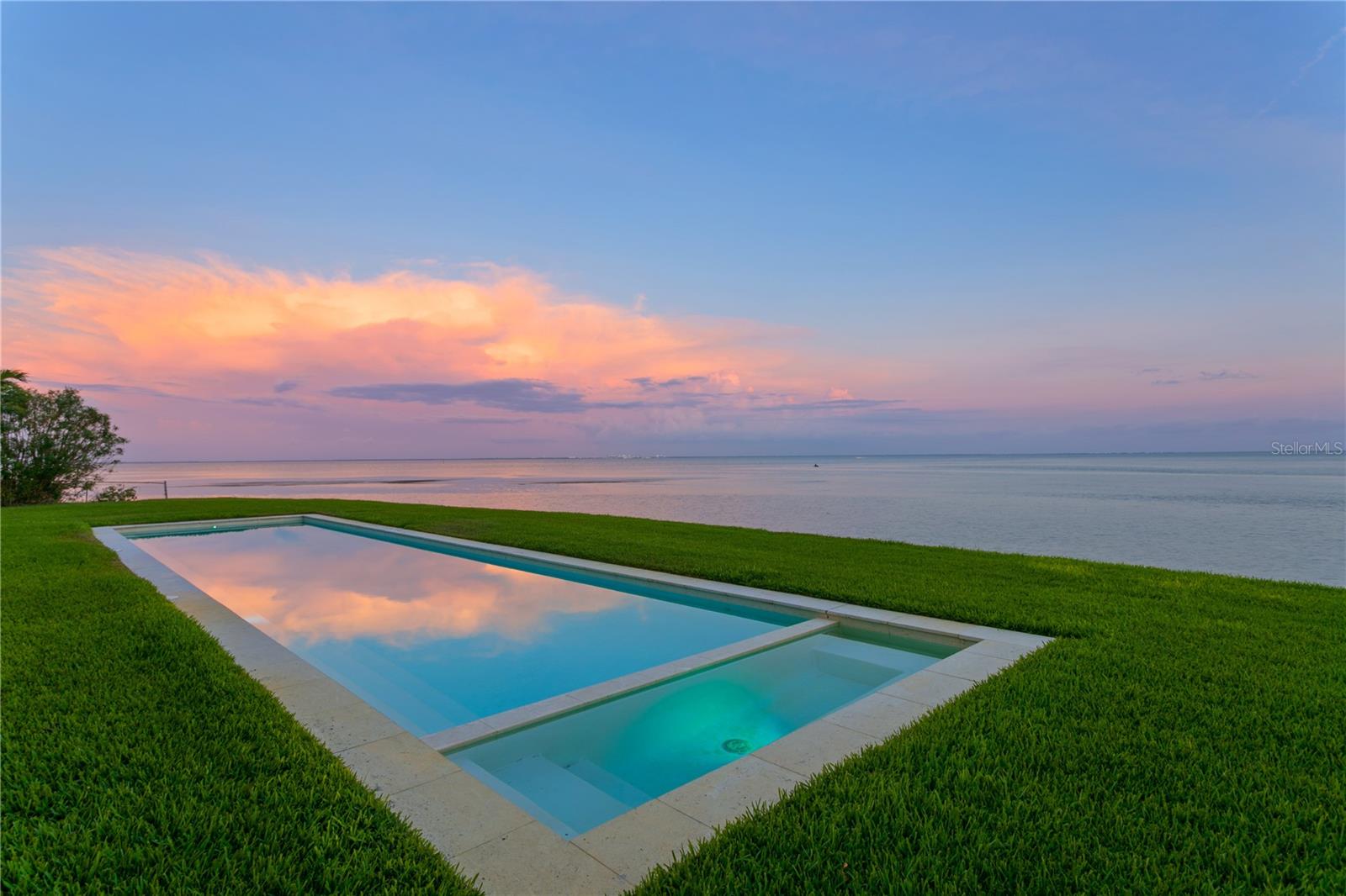 Pull through your own private gate to this stunning 4/3 waterfront, pool home. The views from this home will take your breath away. Perfect for entertaining this impeccable cul de sac home is situated on an oversized lot that looks like something out of a Restoration Hardware catalogue. No detail was missed once inside and just about everything in this beautiful home is new /updated and awaiting its new owner. Just minutes to the beaches, downtown St. Petersburg and Tampa International airport makes this a very desirable location and a boaters dream come true. A must see to believe.... call for your private showing.