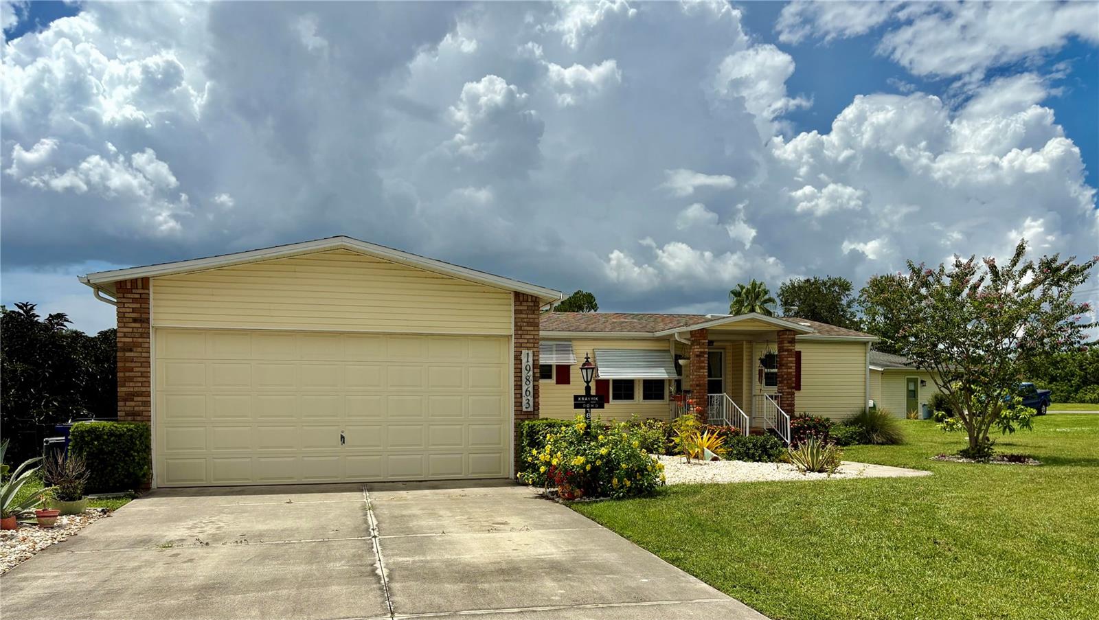 Beautifully Updated Home in Pine Lakes Country Club! Welcome to your slice of paradise in the sought-after Pine Lakes Country Club! This beautifully updated home offers the perfect blend of comfort, style, and resort-style living where you own the land and NOT in a flood zone. Step inside to discover a bright, open layout with modern finishes and hurricane-impact windows for peace of mind. The lovely new Florida room, thoughtfully built onto the back of the home, showcases tranquil water views—ideal for morning coffee or evening relaxation. Newer vinyl flooring throughout as well as beautiful custom countertops. Newer stainless-steel appliances and tankless water heater. lighting and recently painted. Pine Lakes has so many amenities to offer such as golf, tennis, pickleball, shuffleboard, dances, classes, restaurant and so much more.