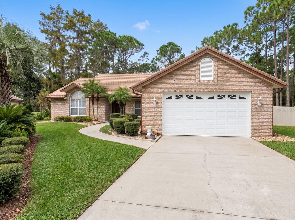 Photo of 105 Marbled Godwit Court, Daytona Beach, FL 32119 (MLS # TB8536765)