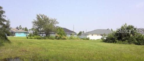 Incredible Location ! Within 1 mile to Coral Grove town center (opening in 2026) Just a few blocks from new $100 million dollar school (opening in 2026) Close to Pine Island and Burnt Store Road. A dozen new commercial and recreational developments are very nearby.