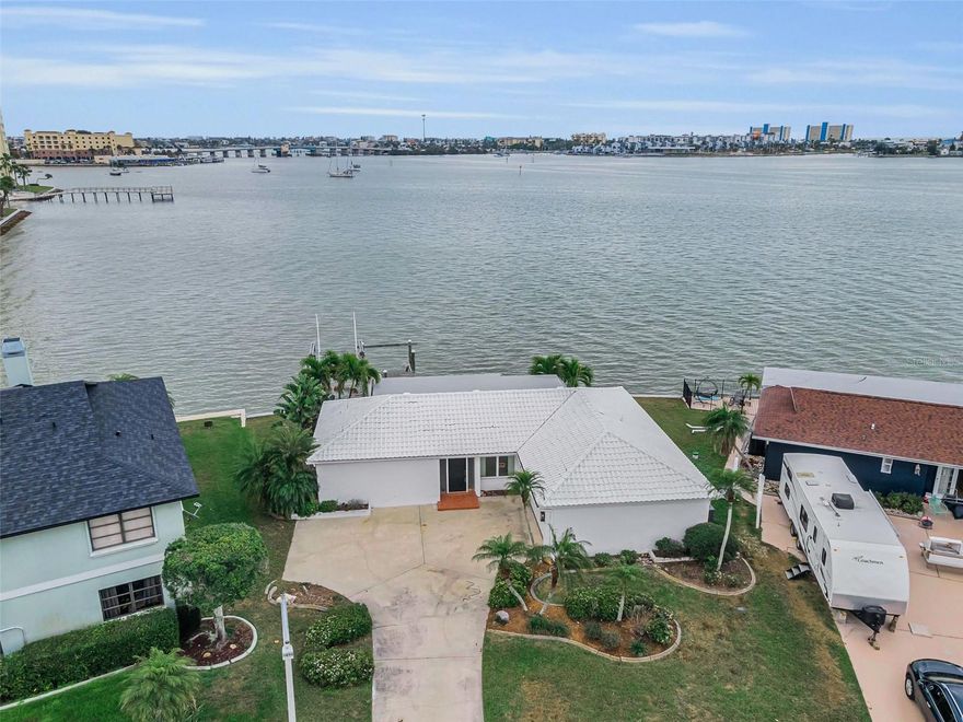 AS-IS; Investor Special – Prime Waterfront Opportunity in St. Petersburg! Unlock the potential of this 2-bedroom, 2-bath waterfront home located in desirable St. Petersburg Florida. This property is post-remediation and ready for reconstruction, offering a clean slate for your vision and design. Situated on a desirable waterfront lot, the home features open deep water access—large enough to accommodate a sailboat—along with a private dock and a newer seawall cap. Enjoy one-of-a-kind, stunning sunset views right from your backyard, creating the perfect setting for true Florida waterfront living. With solid bones and a spacious layout, this is an ideal opportunity for investors, builders, or homeowners looking to create a custom dream home from the ground up. Additional highlights include a 2-car garage and an expansive lot with plenty of potential. The heavy lifting has already begun—bring your contractor and imagination to transform this blank canvas into something truly special. Conveniently located near beaches, shopping, dining, and major roadways.