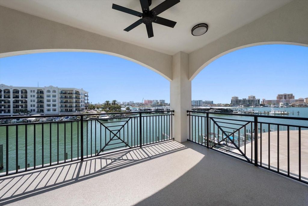 Photo of 211 Dolphin Point #303, Clearwater, FL 33767 (MLS # TB8485711)