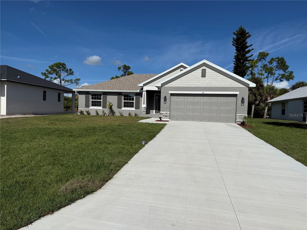 Photo of 49 Long Meadow Place, Rotonda West, FL 33947 (MLS # C7519054)