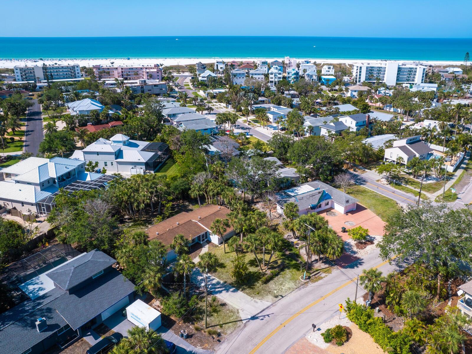 Endless possibilities just two blocks from Siesta Beach! Whether you're looking to build a new island retreat or remodel the existing structure, opportunity awaits, a prime 12,229-square-foot property in the sought-after community of Siesta Isles, just two blocks from the powdery white sands of Siesta Beach, ranked the #1 beach in the USA. This property offers a rare chance to create your dream home in one of Sarasota’s most desirable beach neighborhoods. The structure, previously flooded, has been professionally remediated, offering a clean slate for visionary design. The lot’s generous size and ideal location make it ideally suited for a luxury custom home with room for a pool, tropical landscaping, and seamless indoor-outdoor living. Enjoy beach access just .2 miles away, or stroll less than a mile to Siesta Village, where eclectic shops, lively dining and local entertainment await. From morning walks along the shoreline to breathtaking sunsets over the Gulf, every day on Siesta Key feels like a vacation. And when you're ready to explore beyond the island, downtown Sarasota is just a short drive away, offering world-class dining, arts and culture, including the Ringling Museum, Van Wezel Performing Arts Hall, St. Armands Circle and the ever-popular Sarasota Farmers Market. Unlock the potential to create a one-of-a-kind island residence just moments from world-renowned Siesta Beach.