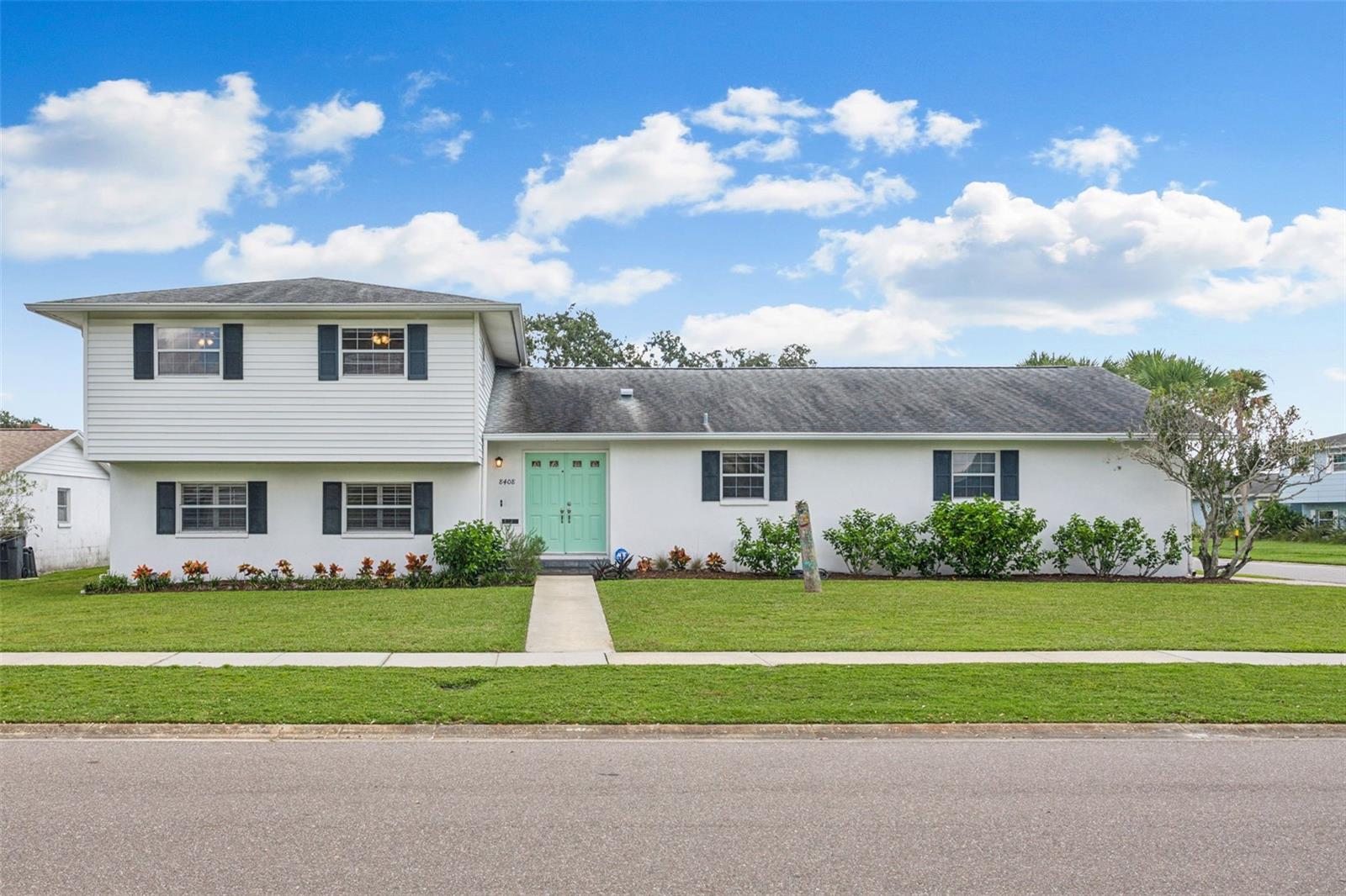 Wonderful POOL home in Baycrest offering 4BR's & 4BA's with incredible versatility to living & design options! This corner lot/cul-de-sac location is a must-see home! Enjoy a split-level design that includes a bedroom (4th), bathroom, & flex room at lower level, the kitchen & dining/living open plan on main level, with your primary (BR1) & BR's 2 & 3 all upstairs. This home is perfect for multi-generational or in-law housing options too! Your expansive main living room area opens fully to a picturesque pool & garden view, complete with newer sealed pavers, freshly painted metal cage with new screws/fastenings, new screens, & new concrete border edge to the pool perimeter deck. The pool area & lanai is equipped with a full bathroom & entrance to & from the garage as well. This fully vinyl fenced back yard & expansive lot offers many options for storage & ample space for many interests from gardening or an outdoor landscaping design &/or a decorative fire pit. The primary bedroom is complete with a large bathroom & walk-in closet design. Two additional bedrooms & a well-equipped bathroom round out your upstairs living area. This home has newer interior paint, a newer vinyl sided fence, & new exterior gutter drains & drain system. The pool is equipped with newer Sta-Rite Posi-Clear RP Cartridge Filter, Hayward Max-Flo XL Pump, & Jandy Tru-Clear Salt System/Salt Cell (all in 2024). All pavers re-sealed in 2024. Bay Crest community offers a community boat ramp to residents & open water boating access! Perfectly located near Tampa International Airport, downtown Tampa, the Veteran’s Expressway & I-275, International Plaza, Westshore Business District, Rocky Point Golf Course, award-winning beaches, Oldsmar, Safety Harbor, & just a short boat ride to popular waterfront destinations.