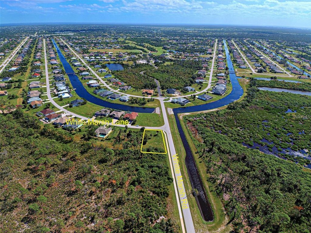 Photo of 147 White Marsh Lane, Rotonda West, FL 33947 (MLS # N6141459)