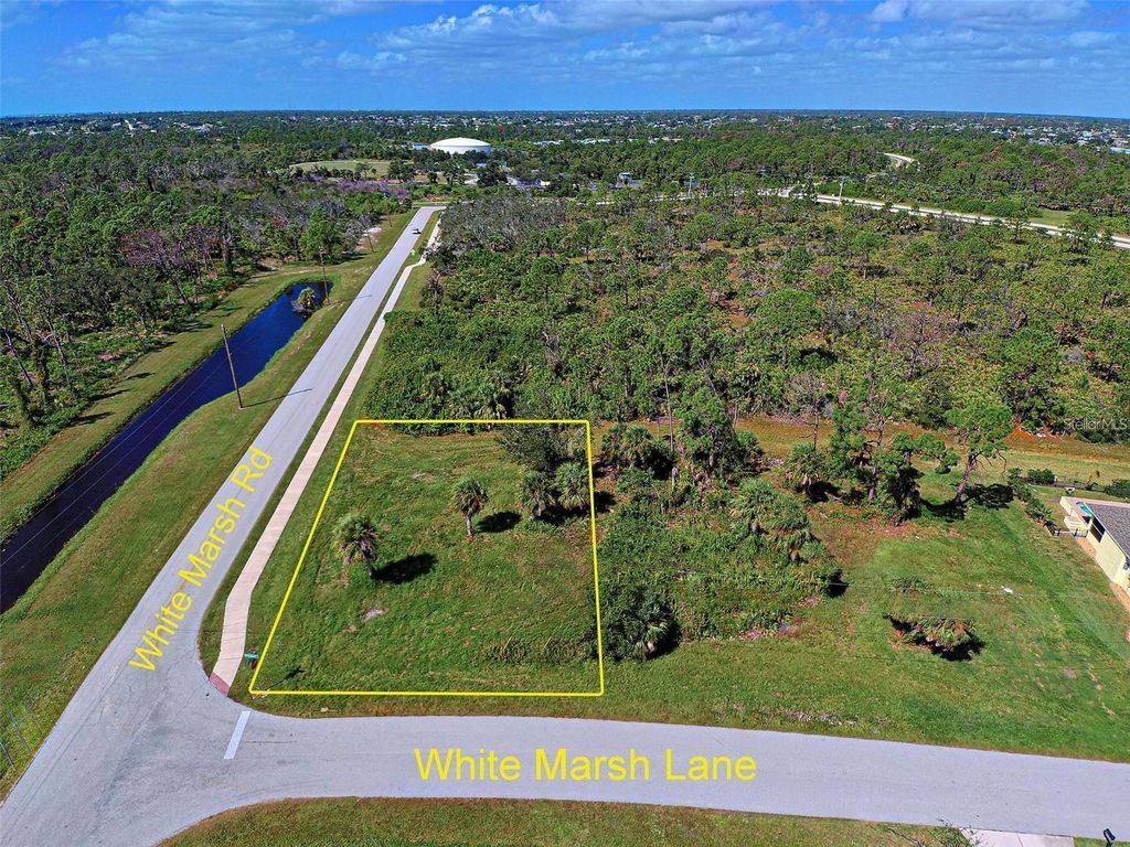 Photo of 147 White Marsh Lane, Rotonda West, FL 33947 (MLS # N6141459)